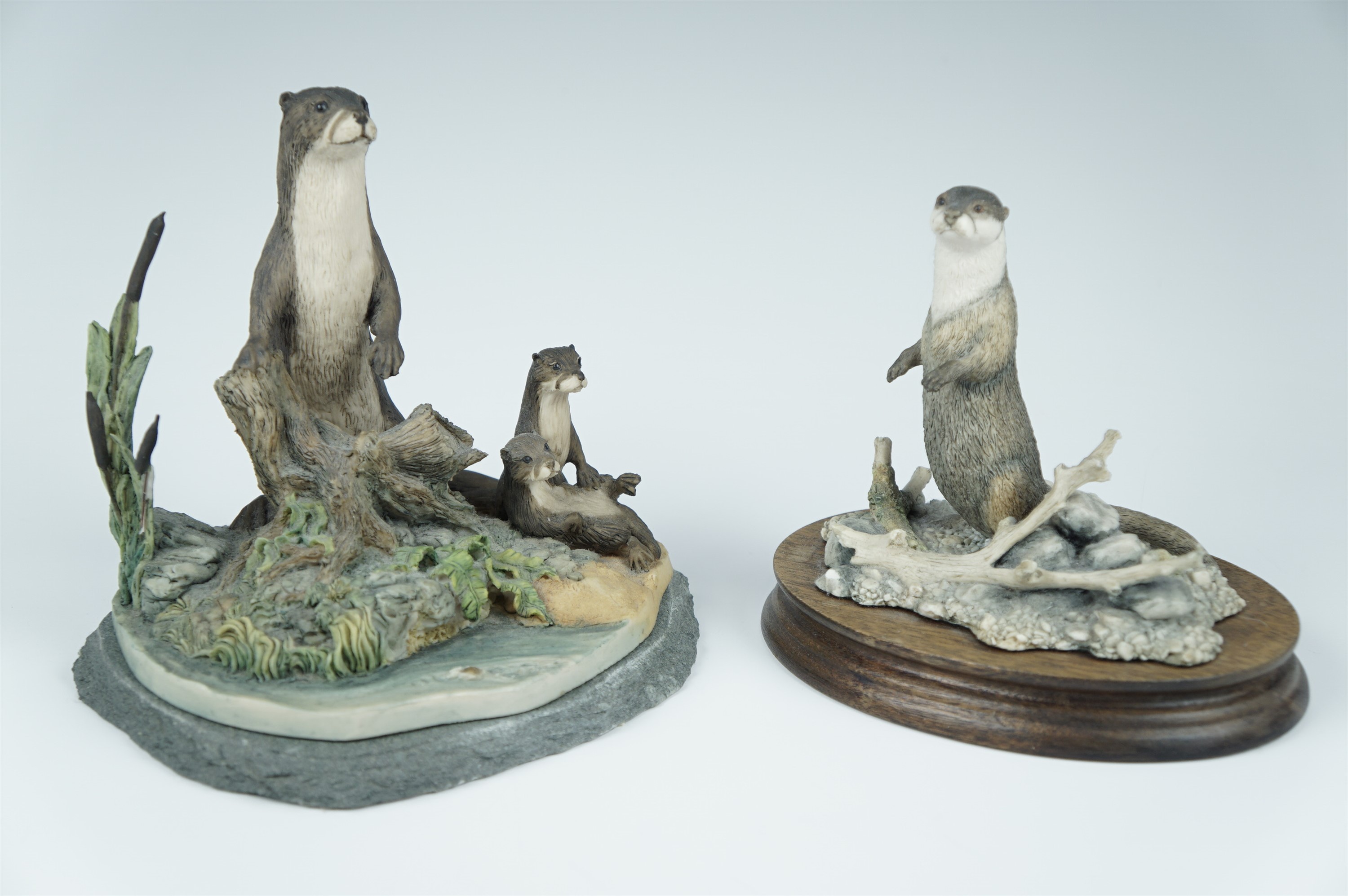 Two Border Fine Arts otter figurines, (one a/f)