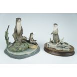 Two Border Fine Arts otter figurines, (one a/f)