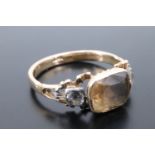 A Victorian citrine coloured and white stone finger ring, comprising a cushion cut stone of approx 8