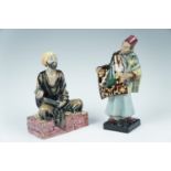 Two Royal Doulton figurines "The Carpet Seller", HN 1464, and "Mendicant", HN 1365, tallest 22.5 cm