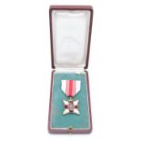A Belgian Red Cross medal, cased