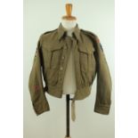 A Second World War Cameronians Battledress blouse, bearing shoulder titles, regimental flashes, 15th