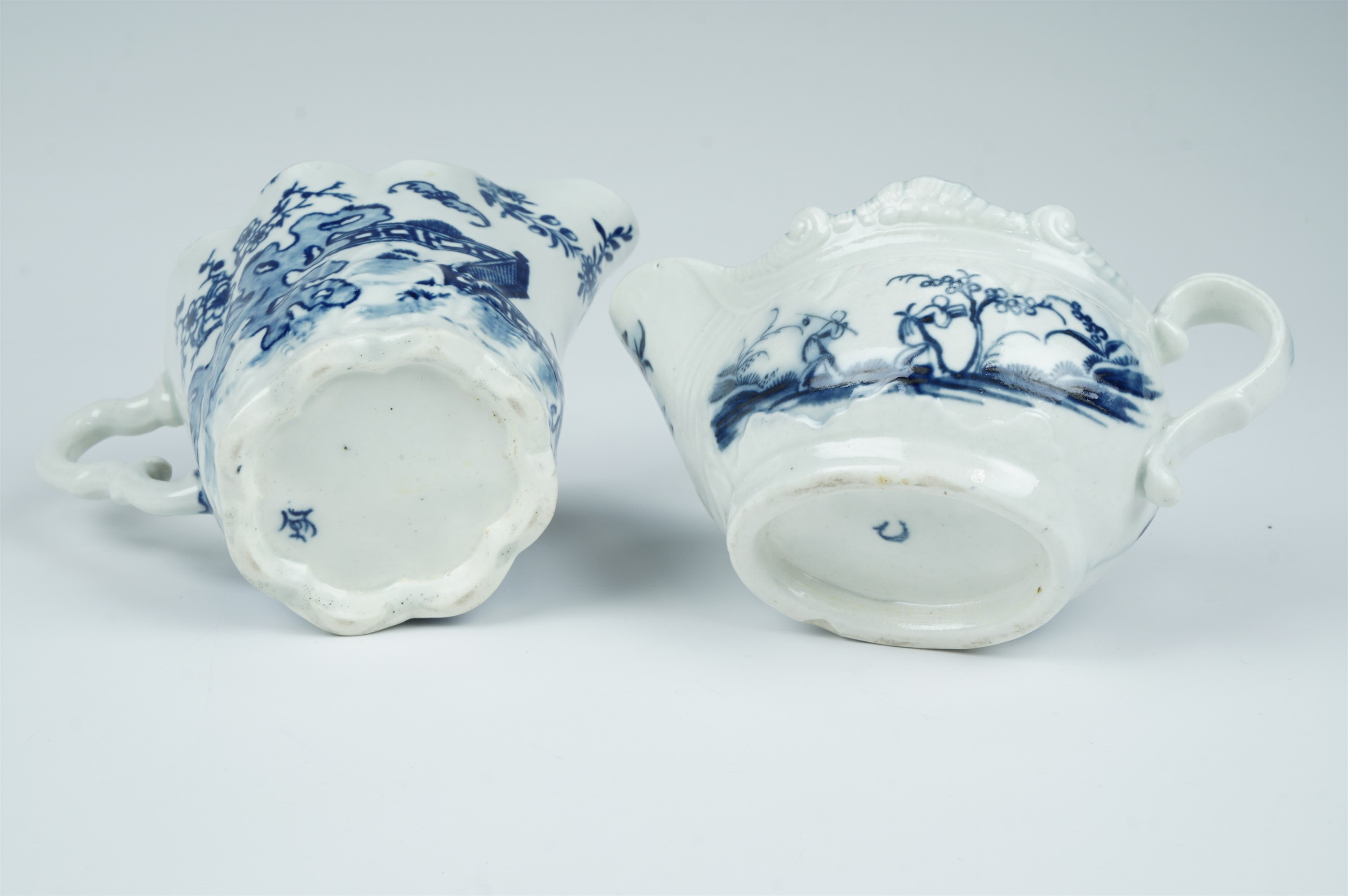 Two 18th Century Worcester moulded blue and white milk jugs, bearing underglaze crescent and - Image 2 of 3