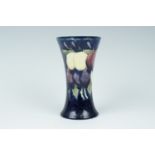 A mid 20th Century Moorcroft Wisteria Plumb pattern vase, bearing Walter Moorcroft signature, 15.5