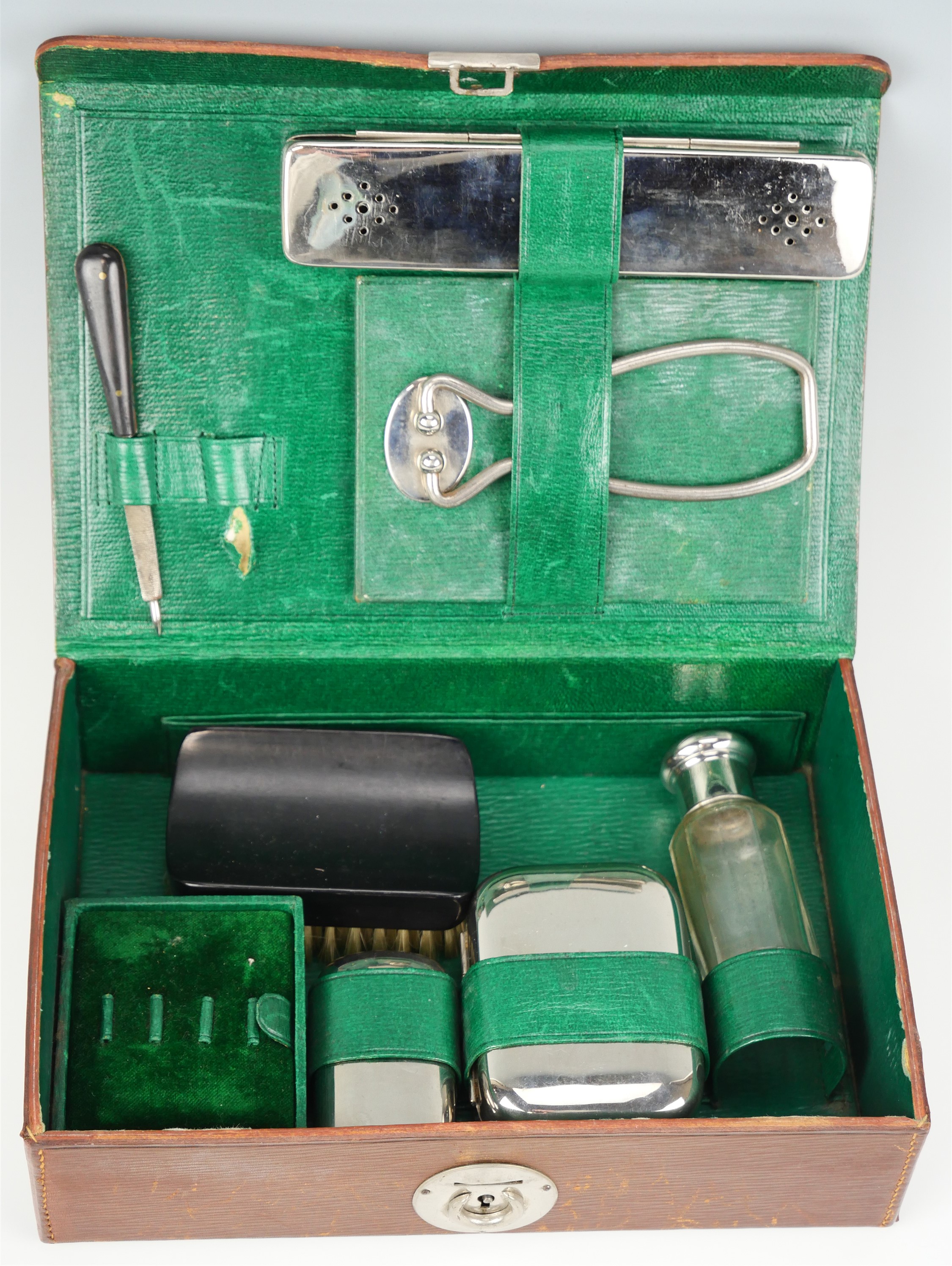 A vintage cased travel grooming set