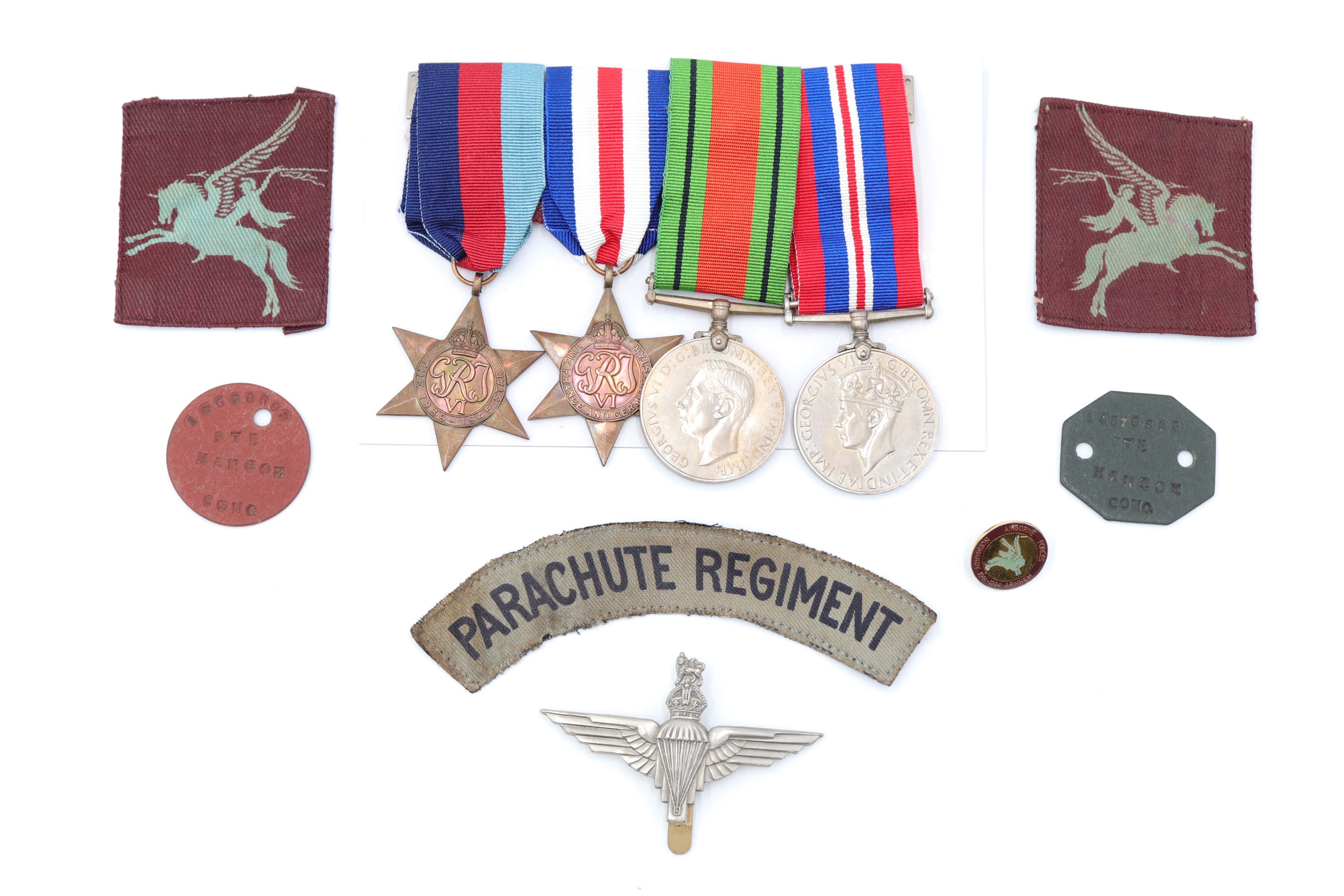 A Second World War 13th Battalion Parachute Regiment group comprising campaign medals, identity