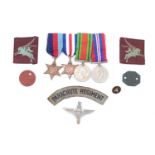 A Second World War 13th Battalion Parachute Regiment group comprising campaign medals, identity