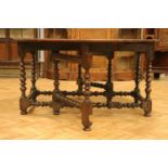 A late 17th / early 18th Century bobbin-turned oak gate-leg dining table, (top later), 143 cm x