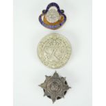 Three lapel badges, comprising white metal Irish Guards, impressed No. 1269 verso, enamelled British