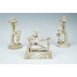 A Royal Worcester blush ivory figurine of a boy sat upon a gate, 1302, together with a pair of