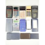 A quantity of vintage calculators including Commodore, Rockwell, Texet etc