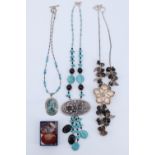 Three late 20th Century silver and semi precious stone necklaces, comprising alternating turquoise