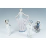 A Lladro lady figurine, 31 cm together with bath time, flower girl and one other