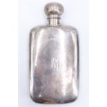 A George V silver hip flask, having a hinged cap with bayonet catch, engraved monogram to the