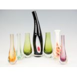 Seven glass teardrop vases, tallest 35 cm