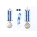 Royal Observer Corps medals respectively to Chief Observer D M Allen and Observer D R Allen, with