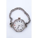 A 1917 Rolex silver cased trench / wristlet watch, having a 15-jewel movement and white enamel
