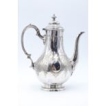 A Victorian electroplated coffee pot by Thomas Prime, of pear shape with chased and engraved