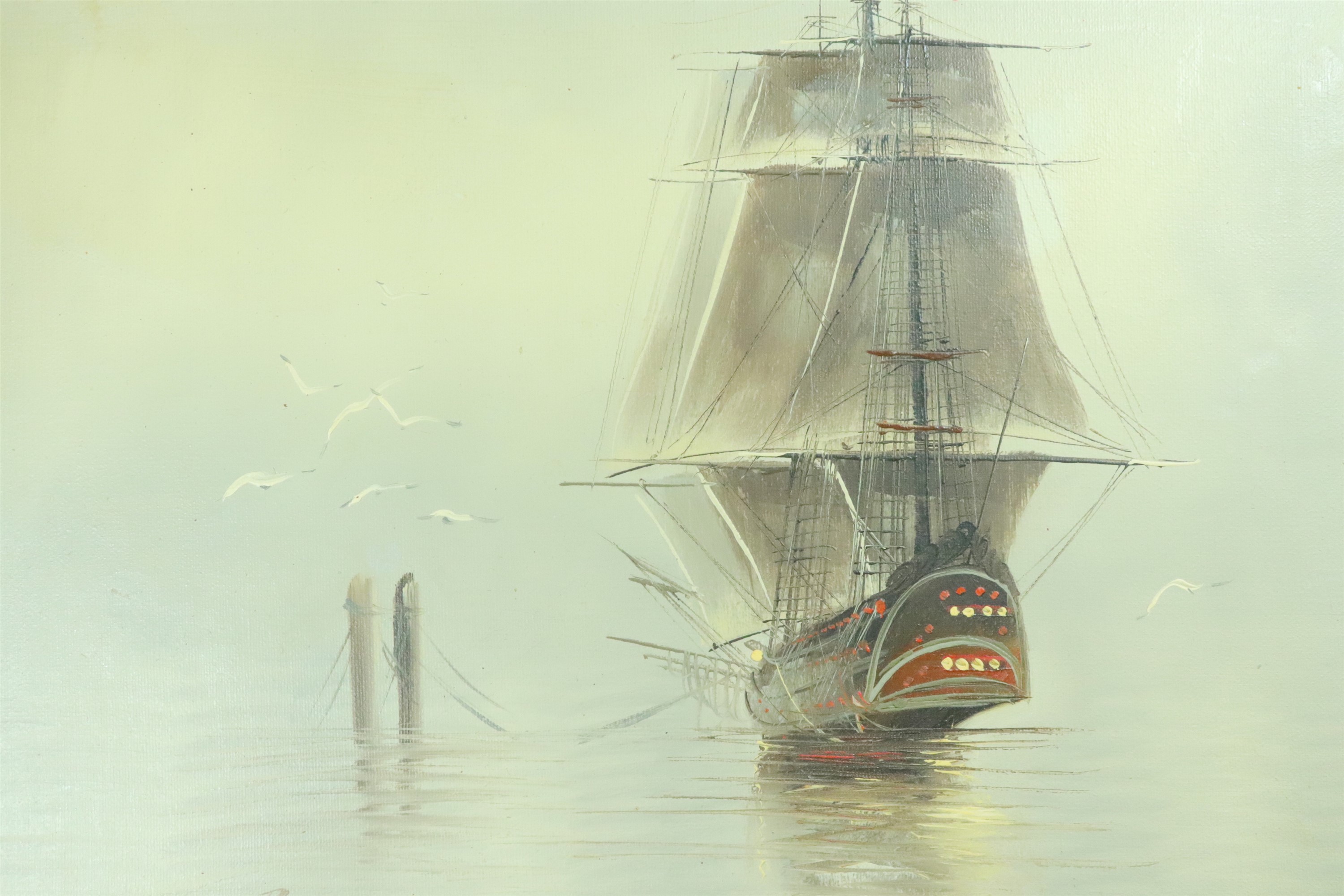 Bannon (20th Century) A misty seascape depicting a docked sailing ship with surrounding seagulls,