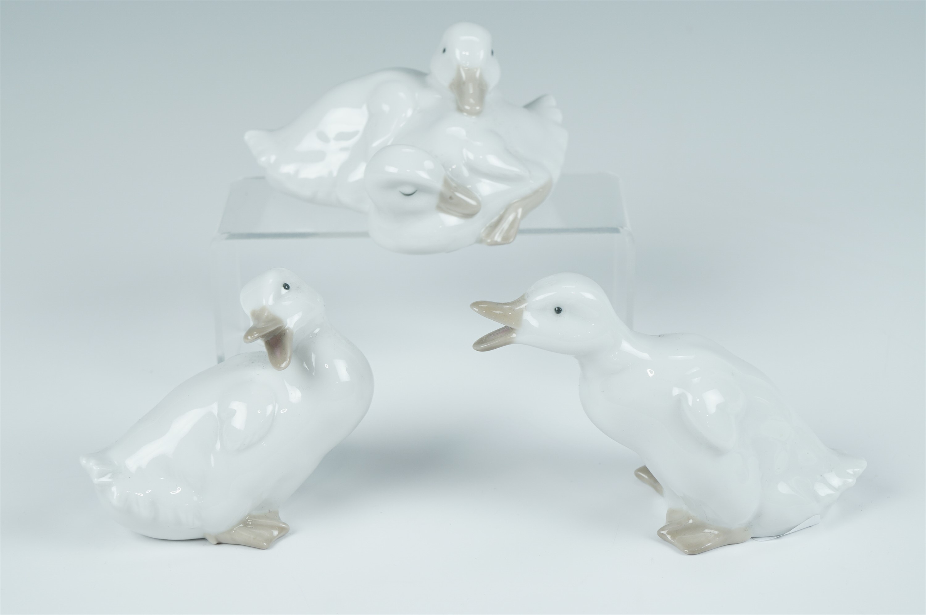 Three Nao goose figurines