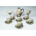 A Royal Doulton series ware coffee set, including Mr Macawber coffee pot, Fagin and Artful Dodger