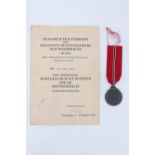 A German Third Reich Eastern Front medal with award document