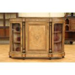 A Victorian gilt metal mounted and inlaid burr walnut veneered credenza, having a book-veneered