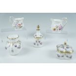 Royal Crown Derby miniature jugs, two lidded jars and vase