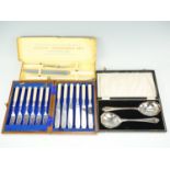 Late 20th Century cased fish eaters, cased serving spoons, and a boxed carving set including a