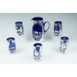 A 1950s cobalt blue glass and lustre decorated lemonade set, comprising a jug and five glasses,