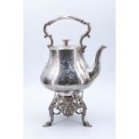 A Victorian silver spirit kettle and stand, of onion form having a cast handle with ivory insulators