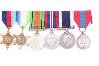 A Second World War campaign medal group with George VI Royal Navy Long Service and Good Conduct