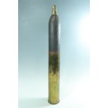 An inert Great War French 75 mm artillery shell with "bee-hive" fuse, together with a shell case