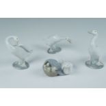 Four Lladro goose figurines