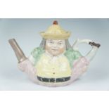 A Victorian pottery Toby teapot, modelled as 'Peg Leg', 27 x 12 x 19 cm