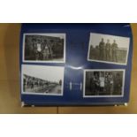 An album containing a large quantity of German Third Reich personal photographs including images