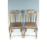 A pair of George V children's oak chairs, 62 cm high