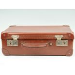 A vintage diminutive faux hide suitcase, circa 1930s, 23 cm x 35 cm x 13 cm