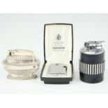 A Ronson "Queen Anne" table cigarette lighter, together with another Ronson table lighter and a