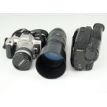 A Minolta 505SI camera, Sigma lens 135-400 mm 1:4.5-5.6, Sony Handycam, etc