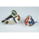 Two Royal Crown Derby paperweights, Carolina duck and robin, with gold stoppers