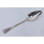 An early 19th Century Old English pattern silver table spoon, having a beeded edge, William Eaton,