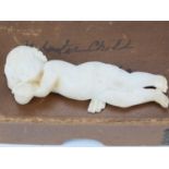 Victorian Grand Tour souvenirs in a carton inscribed "Alabaster child, Florence, 1862" and including