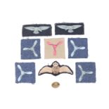 A small group of RAF insignia including a set of pilot's wings