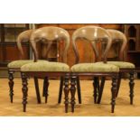 Four Victorian mahogany balloon-back dining chairs