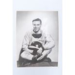 An autographed promotional portrait photograph of racing driver Jim Clarke OBE (1936 - 1968), 8" x