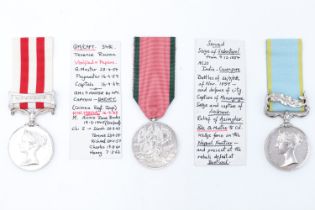 A Crimea Medal with Sebastopol clasp, Indian Mutiny Medal with Lucknow clasp and Turkish Crimea
