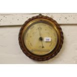 W. Last of Sudbury, circular oak rope pattern aneroid barometer