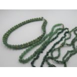 Group of four jadeite necklaces