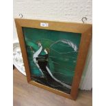Framed leaded coloured glass panel of a lady and a bird, 22ins x 17ins